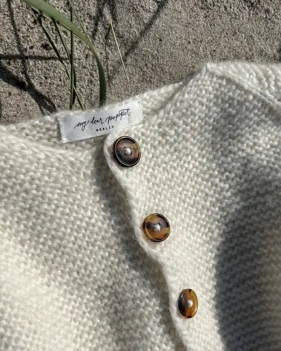 Produktfoto: Maiahs Raglanjckchen Strickanleitung für eine Kinder-Strickjacke in kraus rechts in Raglan von oben