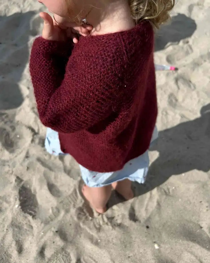 Produktfoto: Maiahs Raglanjäckchen, Strickanleitung für eine Baby Strickjacke in Raglanoptik